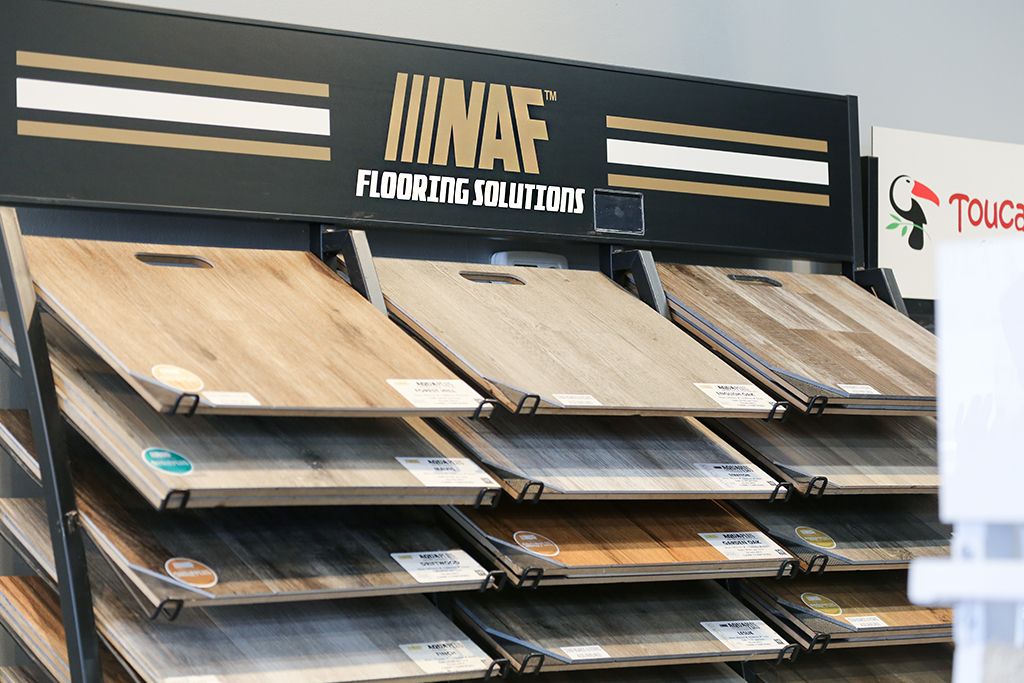 NAF flooring selection on a wall display at El Nino Carpet and Flooring