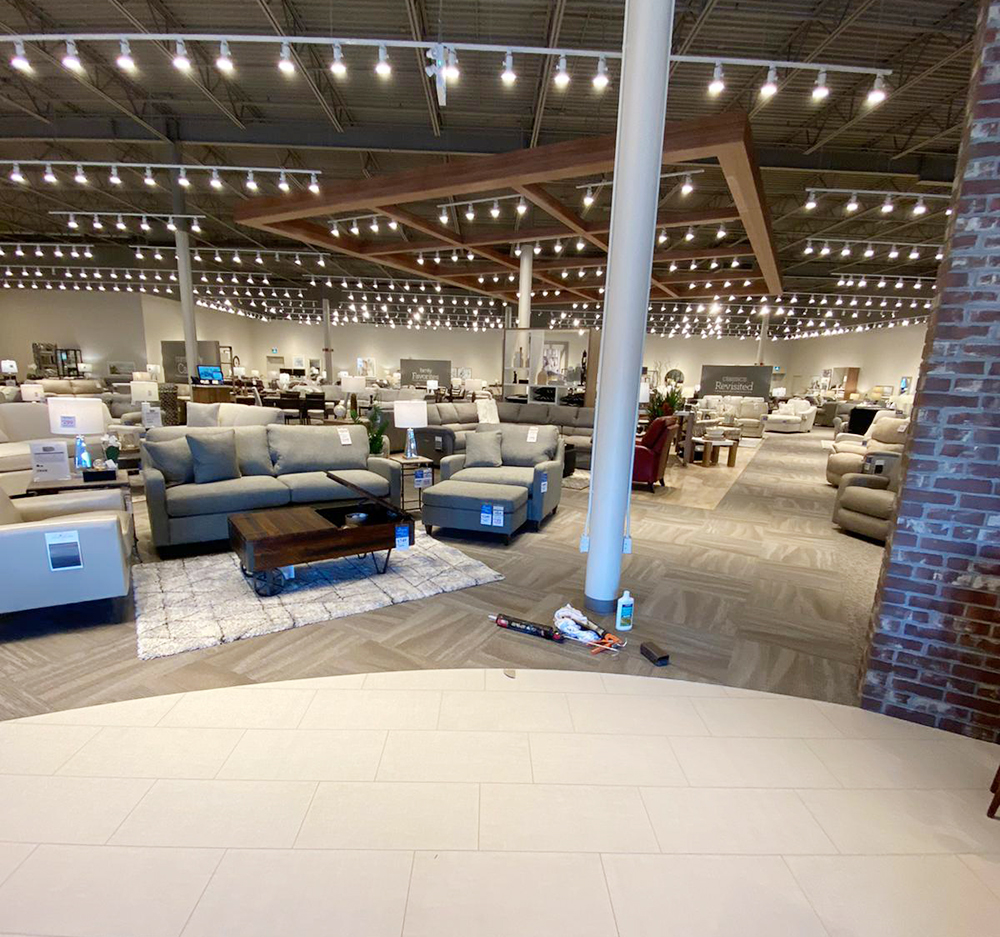 A furniture store's showroom with new commercial carpet installed by El Nino Carpet and Flooring professionals