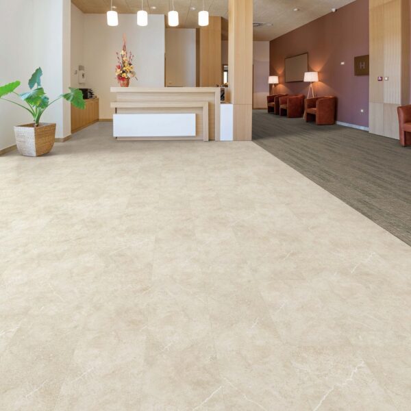 Next Floor Tuscan Sandstone collection Buff 446-102 vinyl flooring installed in a lobby
