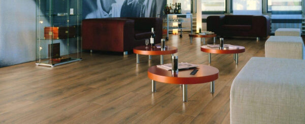 Stevens Omni Kronotex Evolution collection Summer Oak 3901 laminate flooring installed in a living room