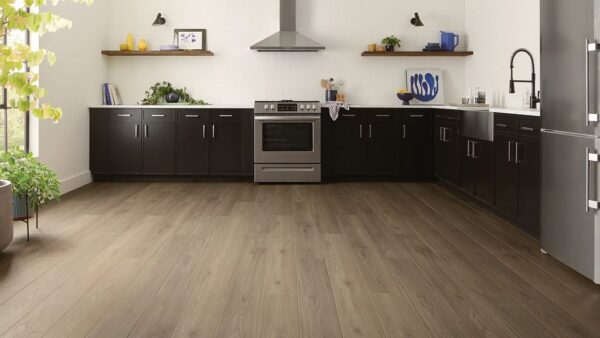 COREtec Floors VV735 collection Aver Walnut 07018 vinyl plank flooring installed in kitchen